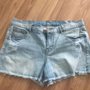 Light denim distressed shorts